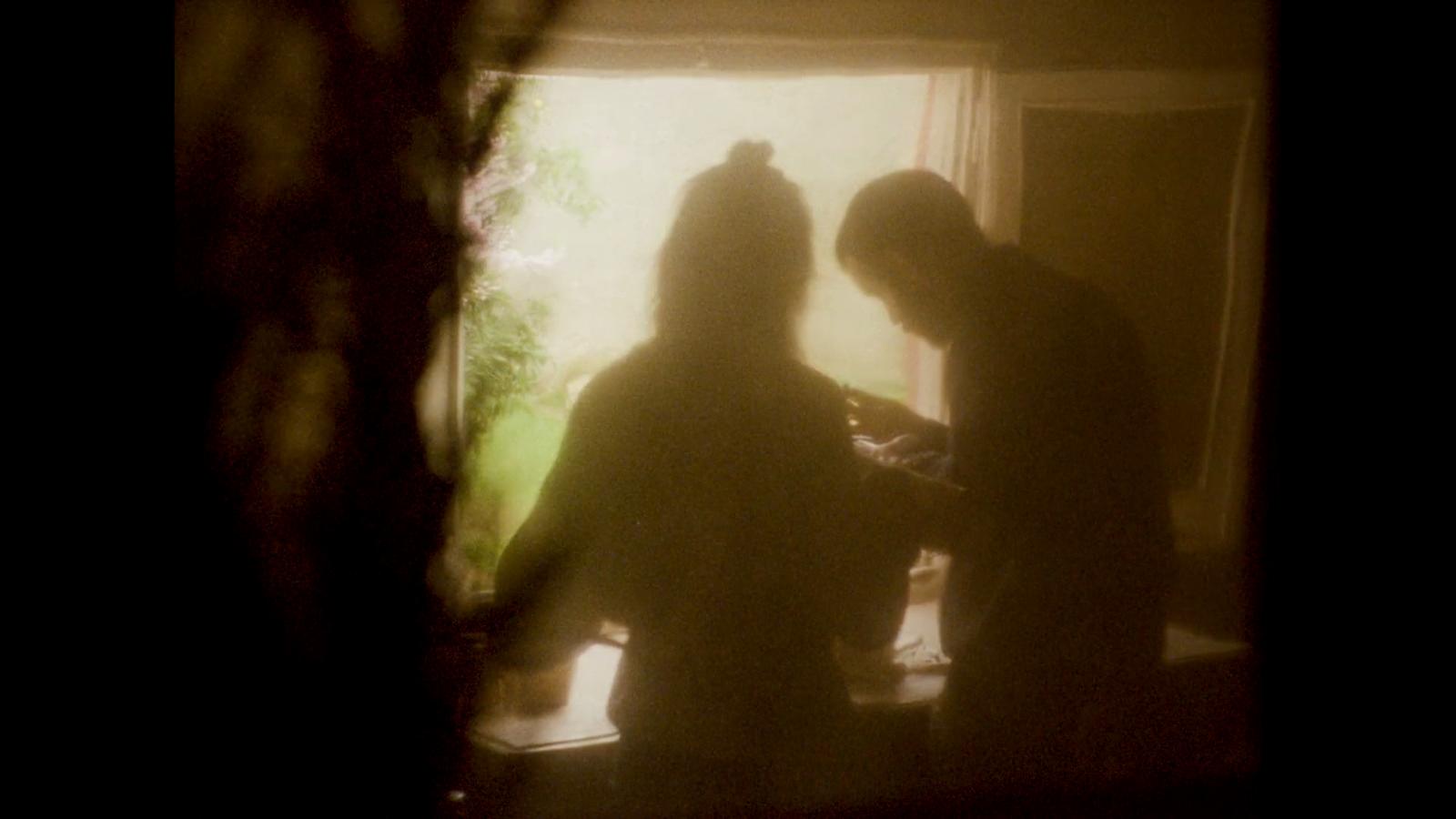 a couple of people that are standing in a room