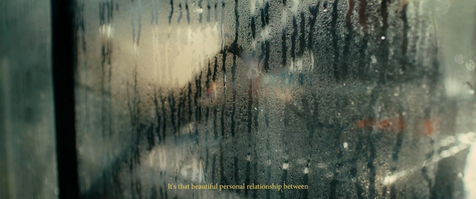 a close up of a window with rain drops