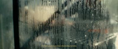 a close up of a window with rain drops