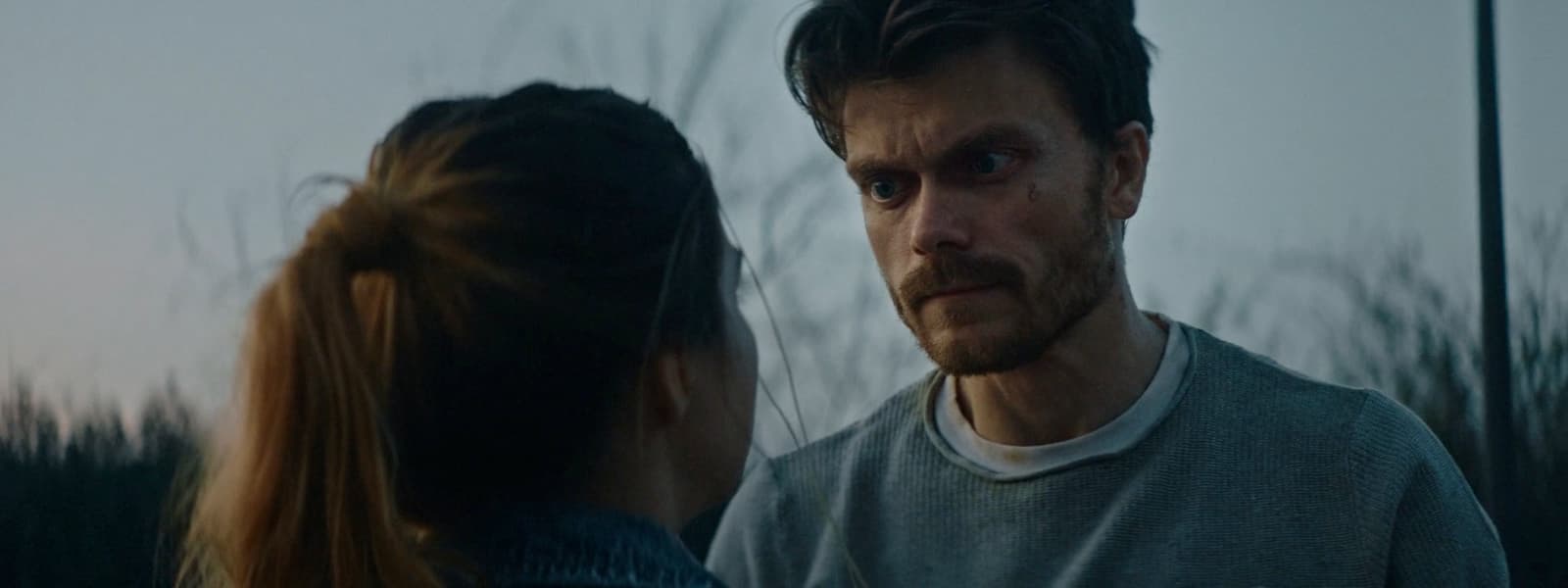 a man and a woman standing next to each other