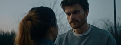 a man and a woman standing next to each other