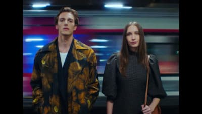 a man and a woman standing next to each other