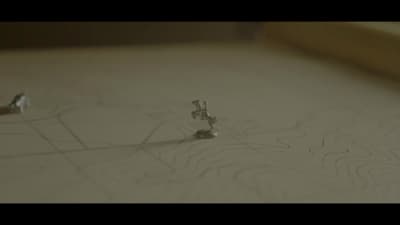 a close up of a small metal object on a table