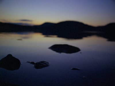 a picture of some rocks in the water