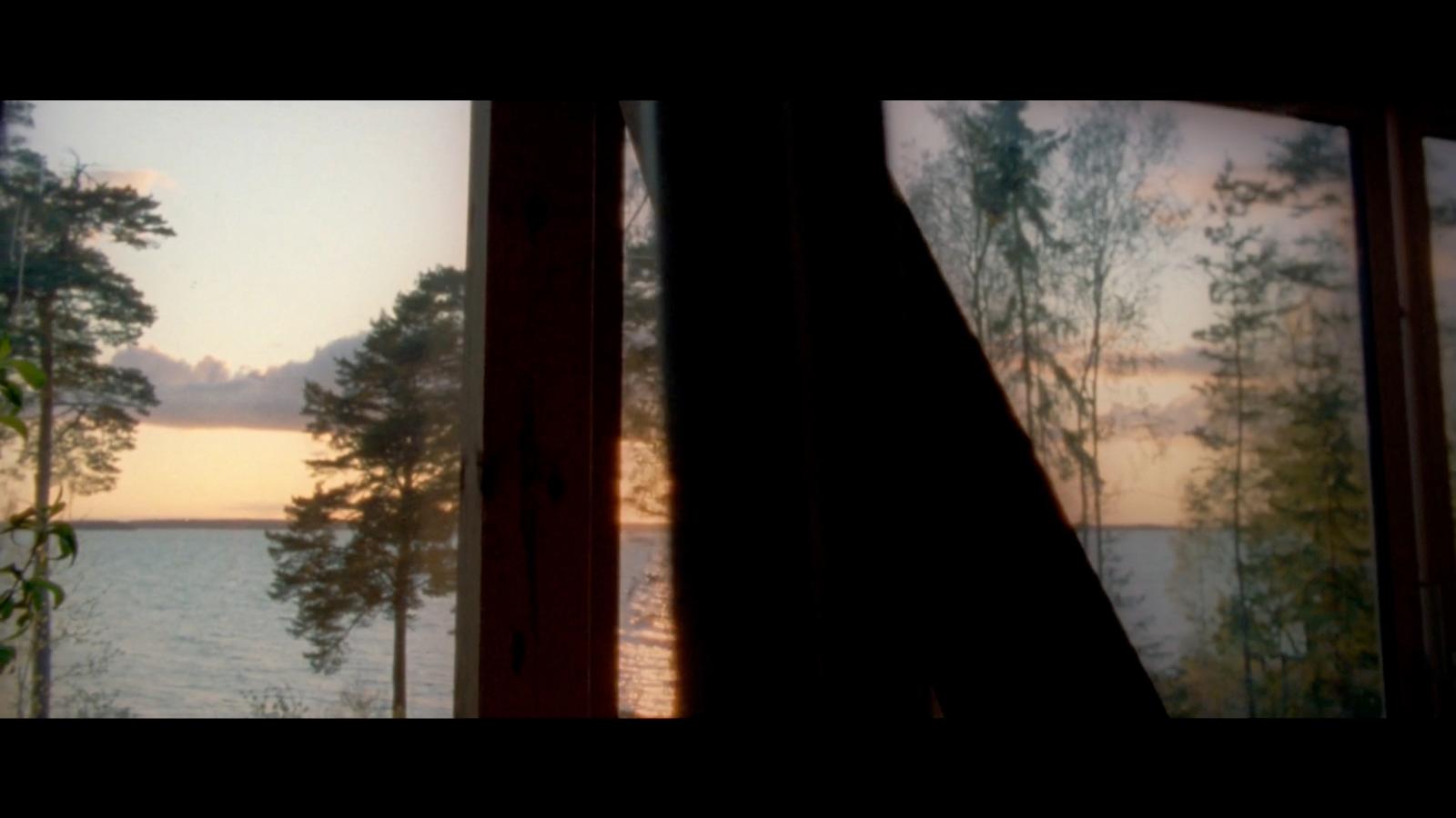 a view of a lake through a window