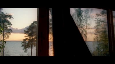 a view of a lake through a window