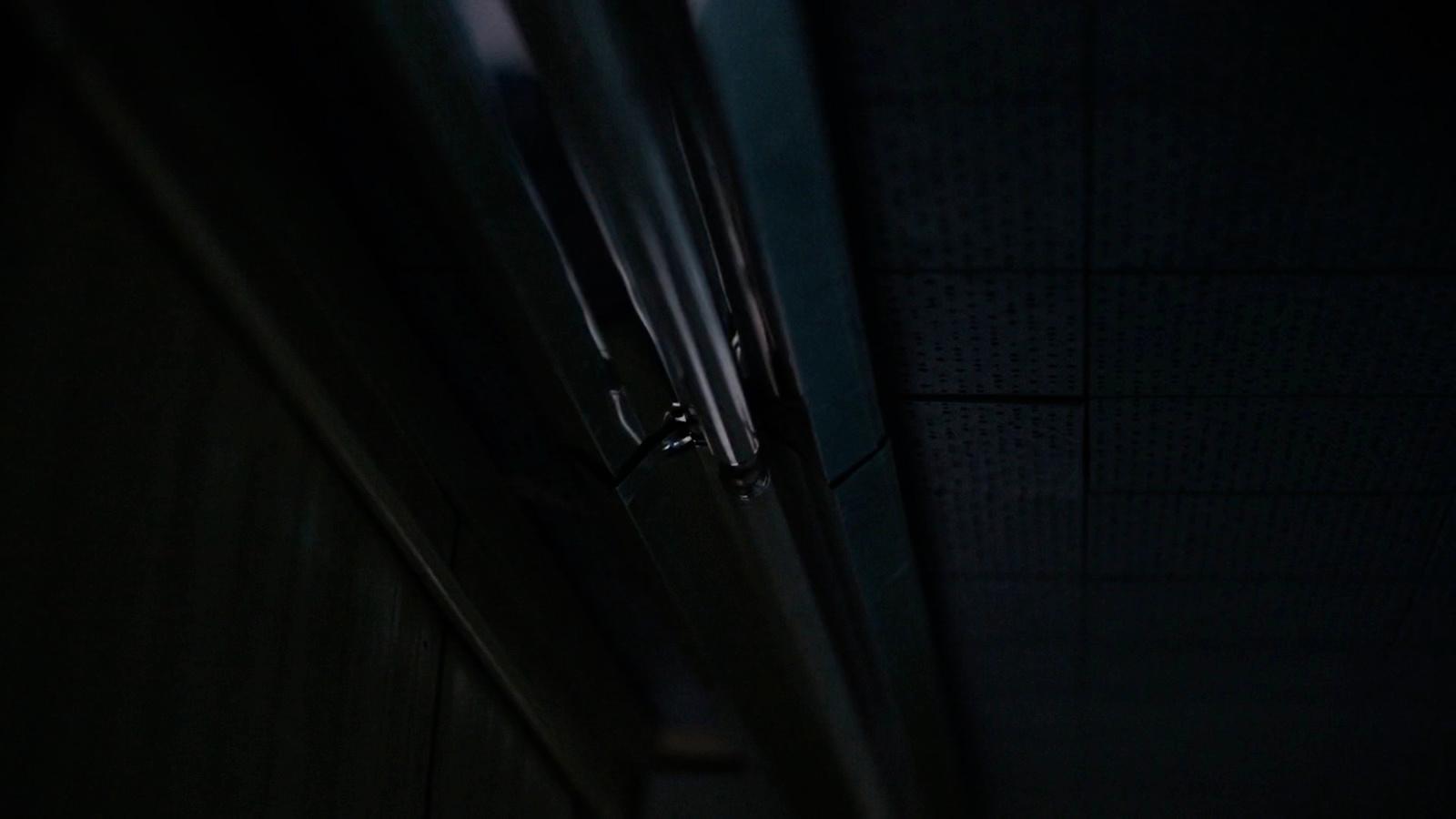 a door is open in a dark room