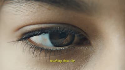a close up of a person's blue eye