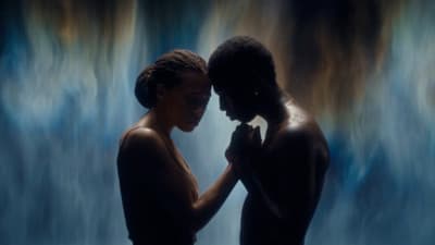a couple of people standing next to each other