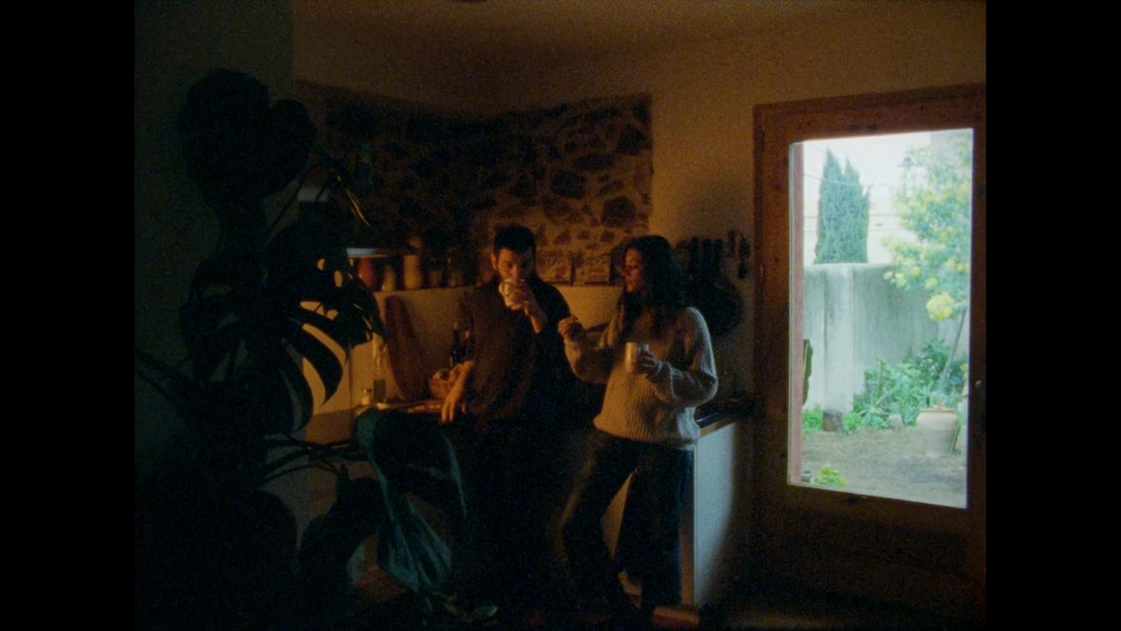 a group of people standing next to each other in a room