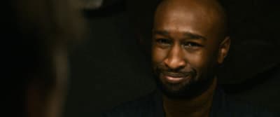 a close up of a person with a beard