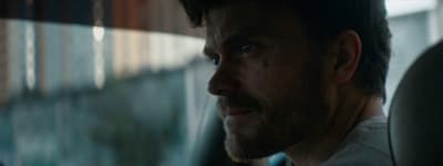 a close up of a person in a car