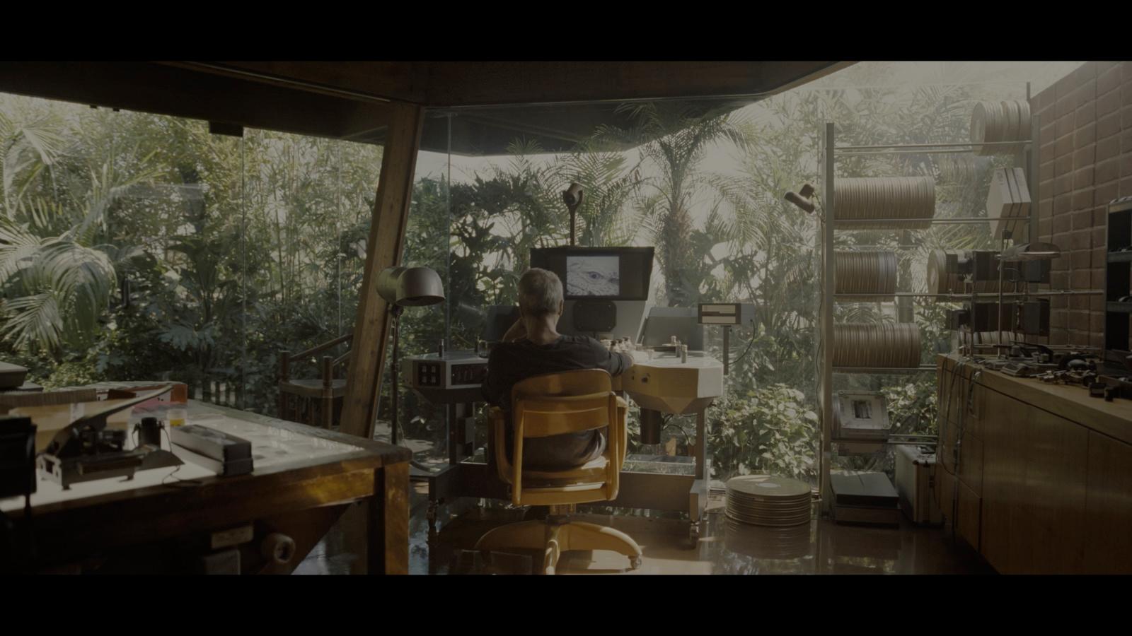 a person sitting in a chair in a room
