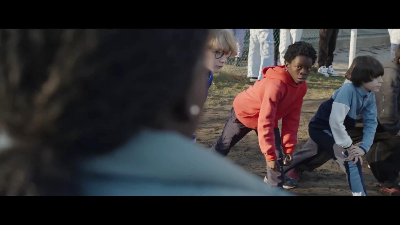 a group of people standing around each other