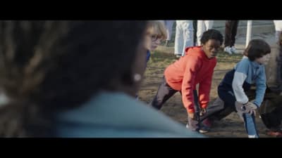 a group of people standing around each other