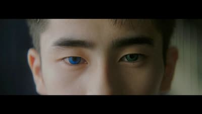 a close up of a person with blue eyes