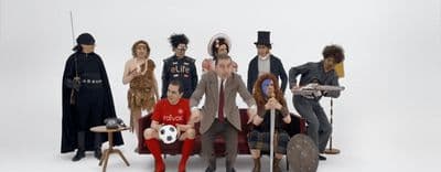 a group of people dressed up in costumes