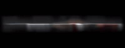 a blurry photo of a person holding a tennis racket