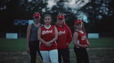 a group of young women standing next to each other