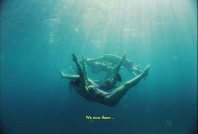 a group of people in the water