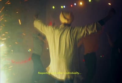 a man in a turban dancing at a party