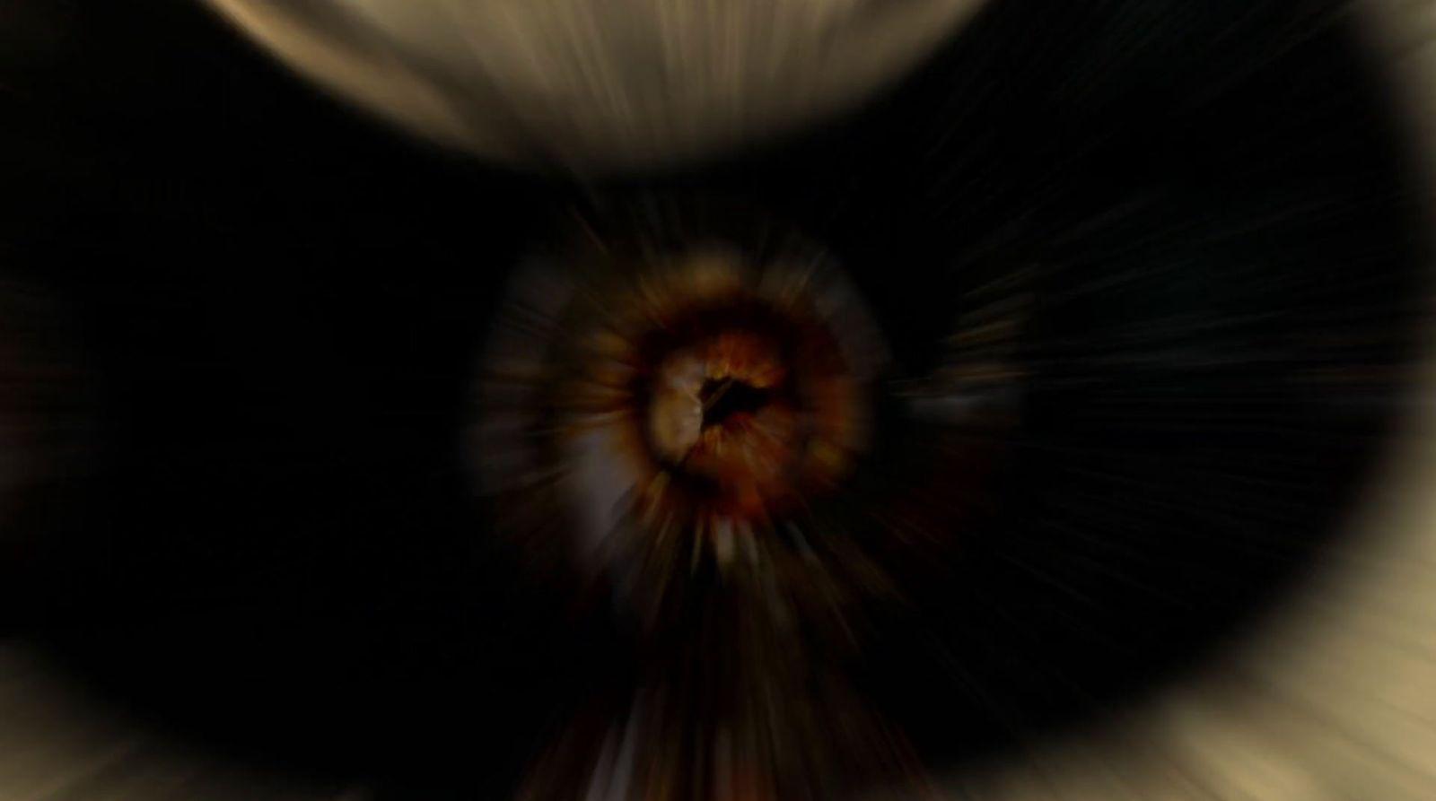a blurry photo of a black and white object