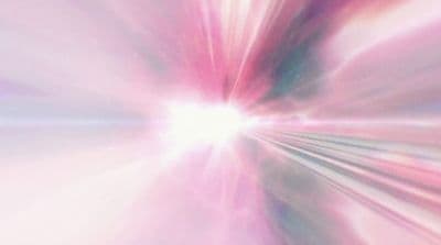 a blurry image of a pink and white background