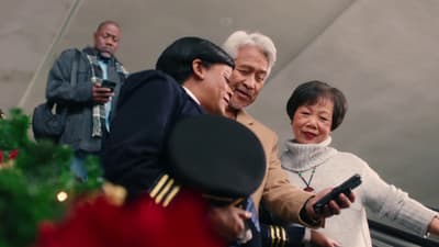 a group of people standing next to each other
