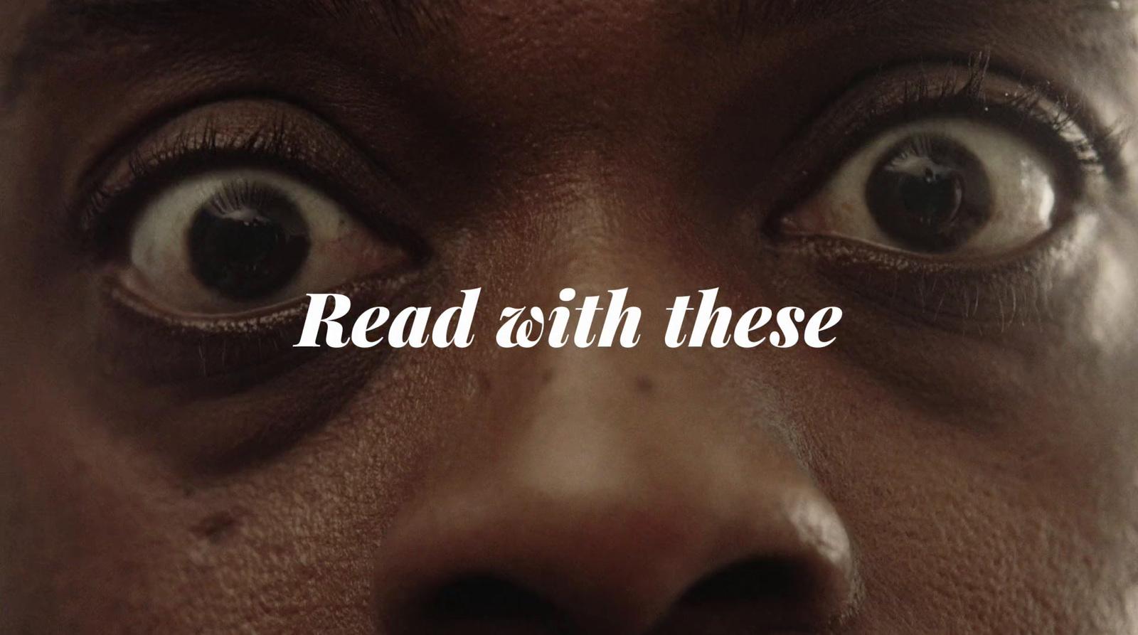 a close up of a person's face with the words read with these