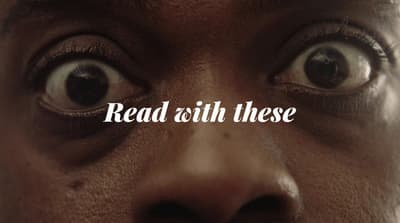 a close up of a person's face with the words read with these