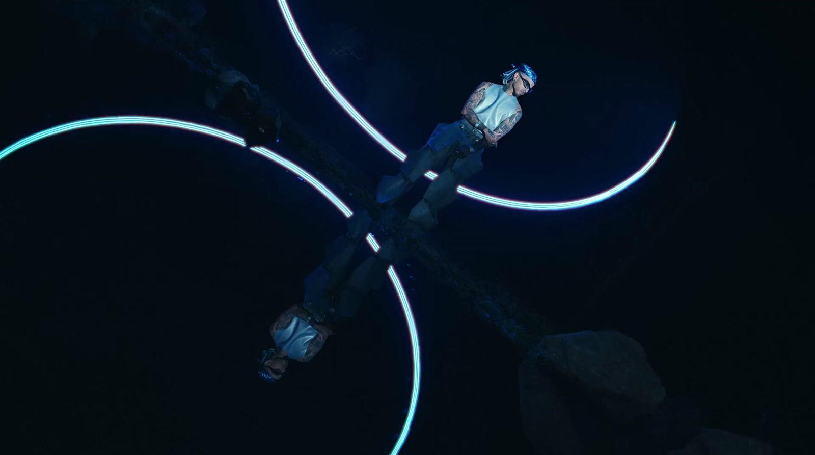 a man standing on top of a wooden pole in the dark