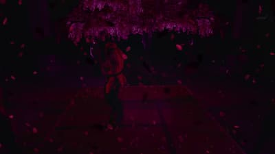 a person standing under a tree in the dark