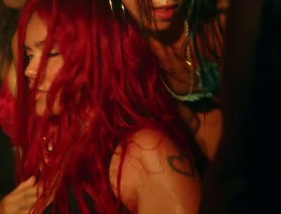 a close up of a person with red hair