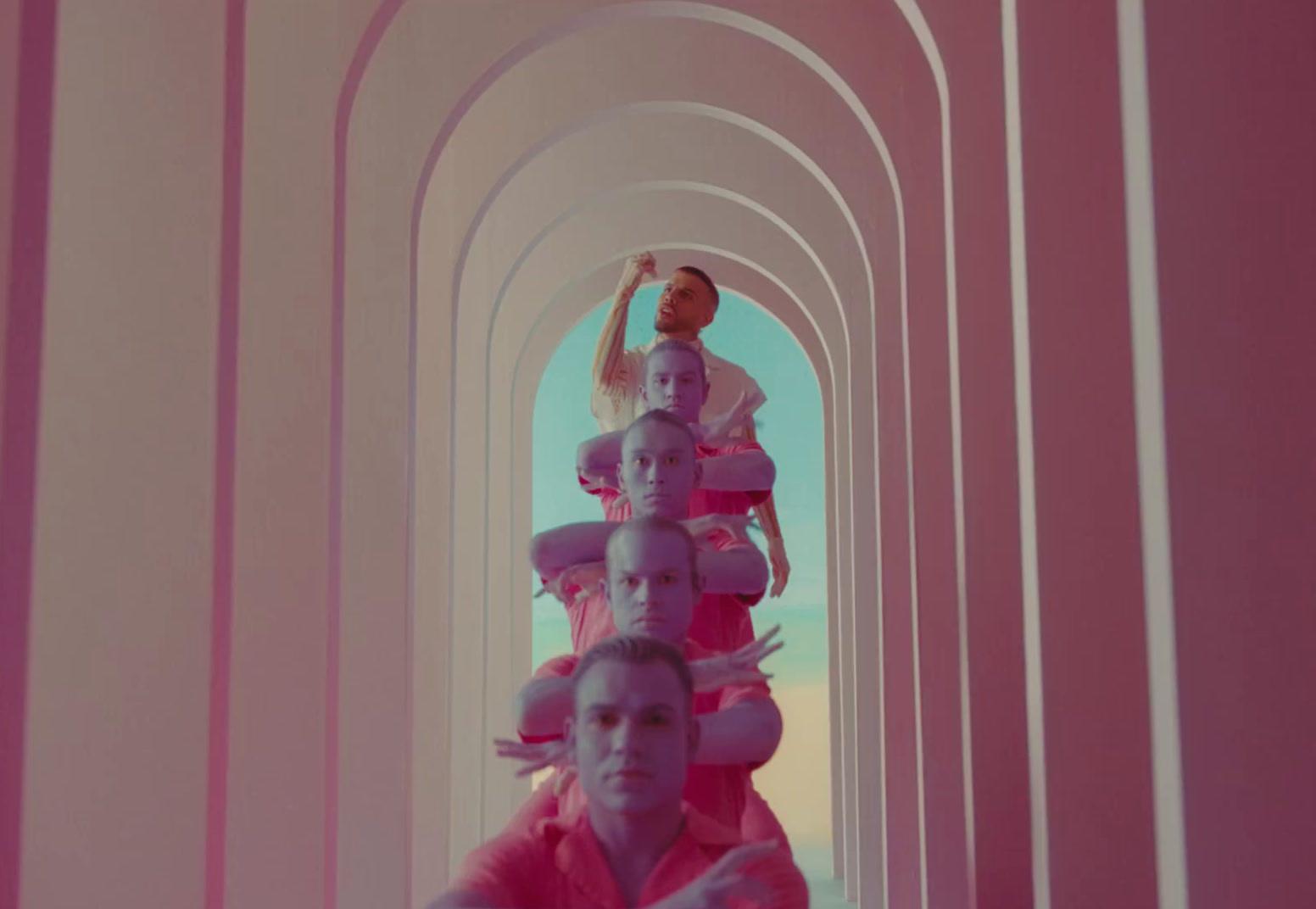 a group of people standing in a tunnel
