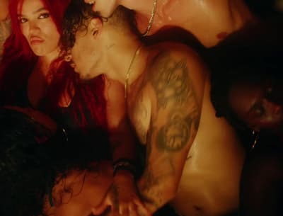 a group of people laying on top of each other
