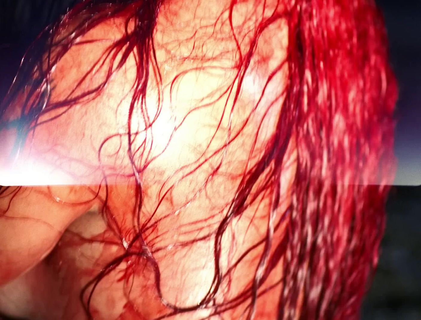 a close up of a person with red hair