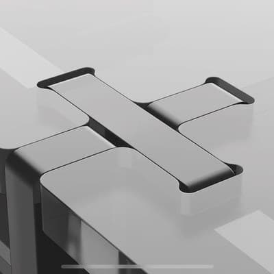 a black and white photo of a modern desk