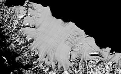 a black and white photo of a mountain