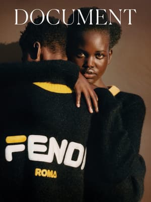 a man and woman embracing each other on the cover of a magazine