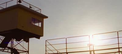 a tall tower with a clock on the top of it