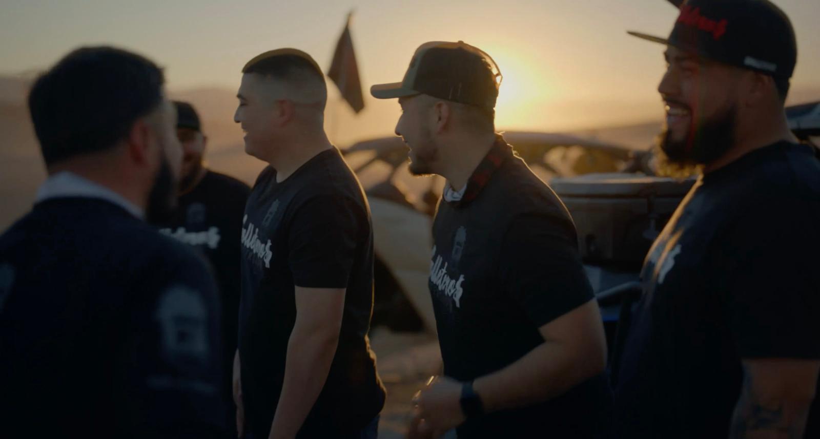 a group of men standing next to each other