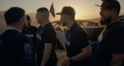a group of men standing next to each other