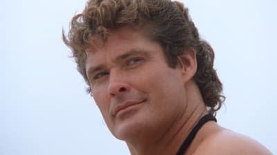 a close up of a man with no shirt on
