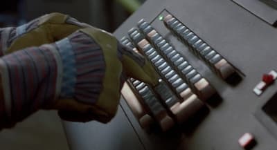 a person is typing on a computer keyboard