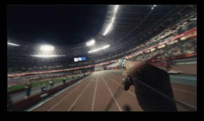 a blurry photo of a person's hand on a track