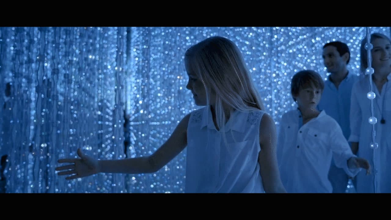 a group of people standing next to each other