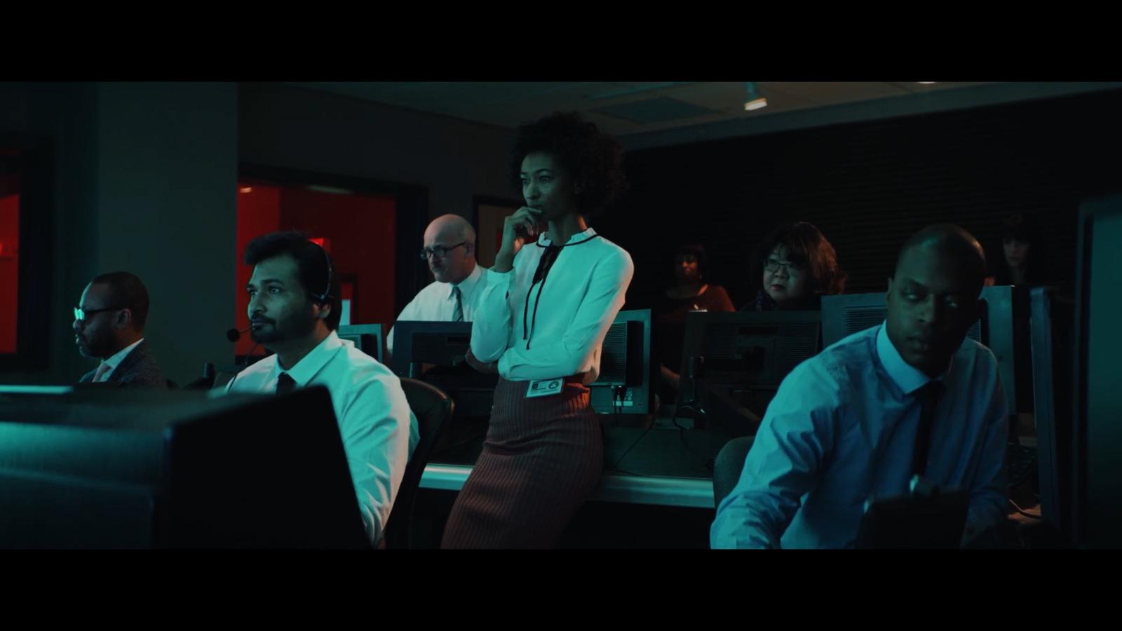 a group of people sitting in a room