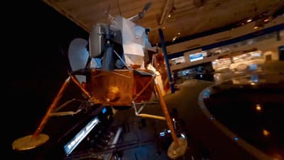 a space shuttle is shown in a museum