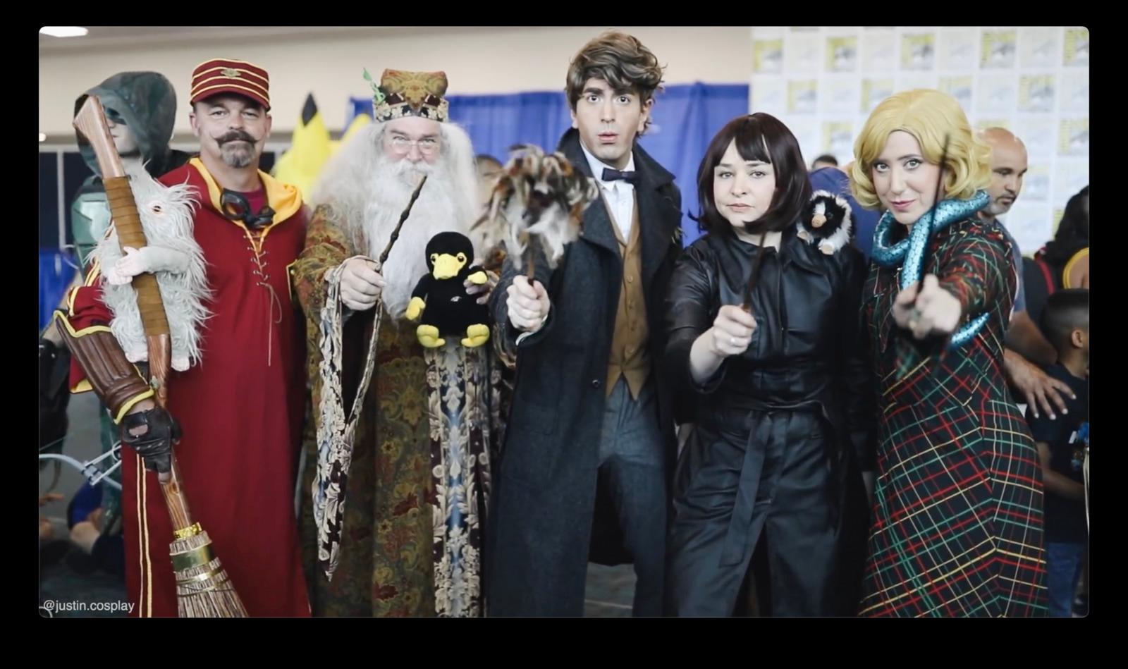 a group of people standing next to each other