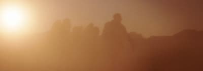 a blurry photo of a person standing in the fog